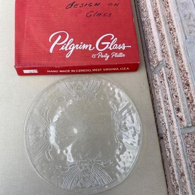 Glass platter with angels etched in