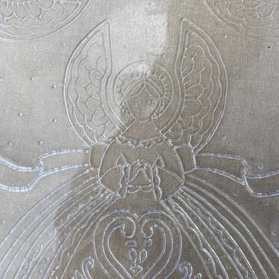 Glass platter with angels etched in