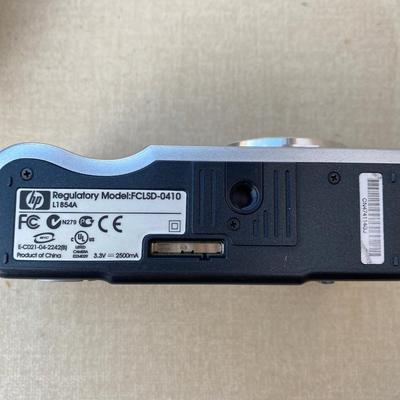 HP three. Two MP 15 times zoom photo smart camera with case