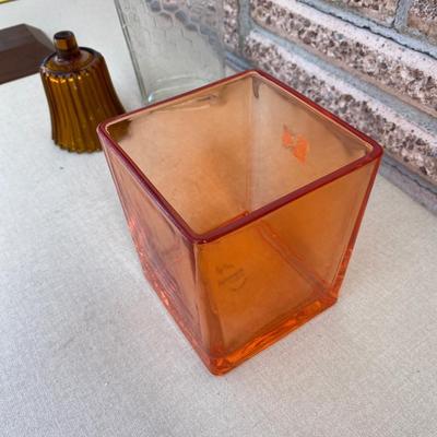 Assortment of glass flower vases and candle holders