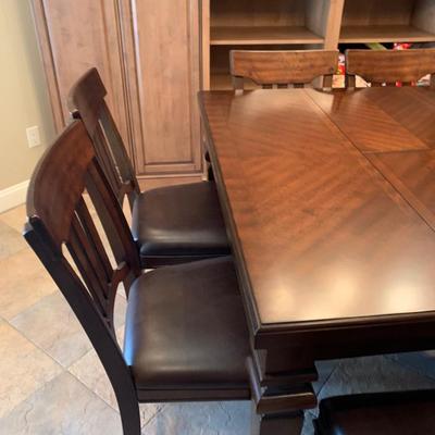 LOT 43R: Carter 9pc Counter Height Dining Set  (Like New)