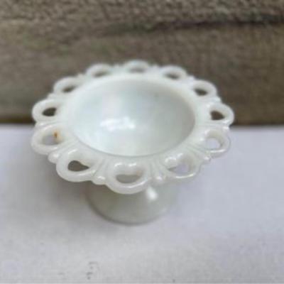 Vintage milk glass candy dish in pedestal.
