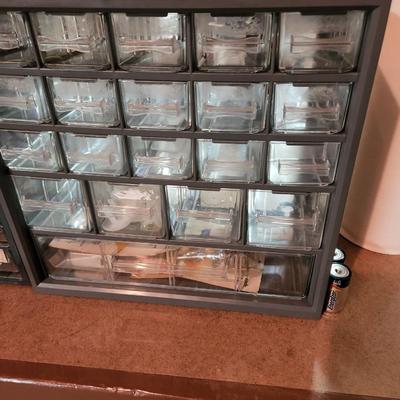 3 Storage Cabinets filled with nuts, screws ,springs, and more