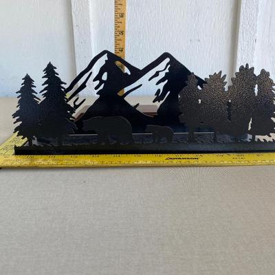 Metal mountain scene with bears