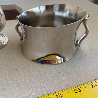 Assortment of three silver colored items