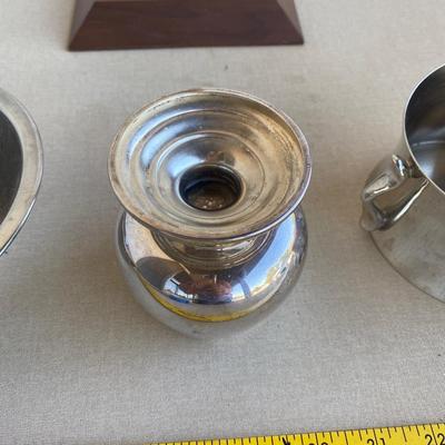 Assortment of three silver colored items