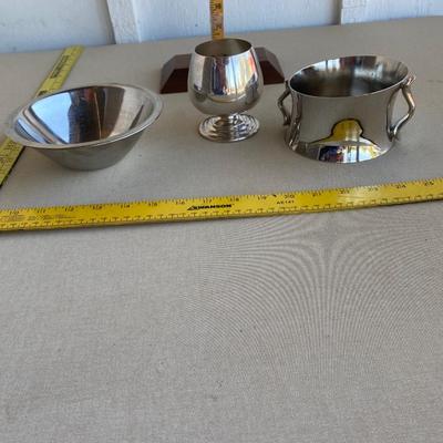 Assortment of three silver colored items
