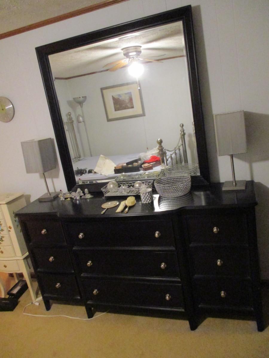 9 Drawer Black Dresser With Mirror | EstateSales.org