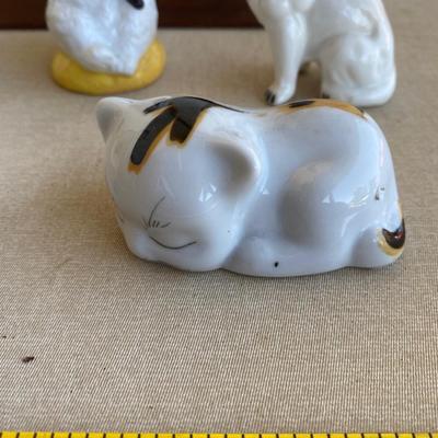 Assortment of cat figurines