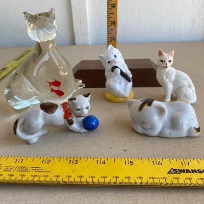 Assortment of cat figurines