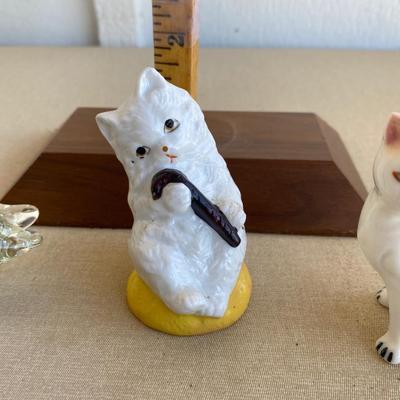 Assortment of cat figurines