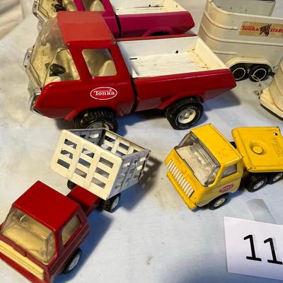 Flat of Vintage TONKA small toys
