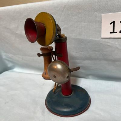 Antique Tin Candlestick Phone toy.