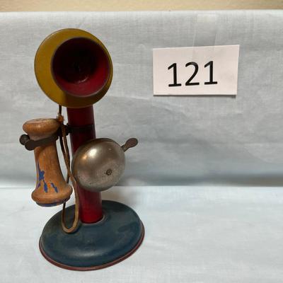 Antique Tin Candlestick Phone toy.