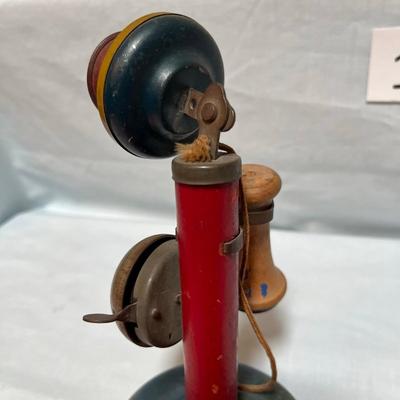 Antique Tin Candlestick Phone toy.