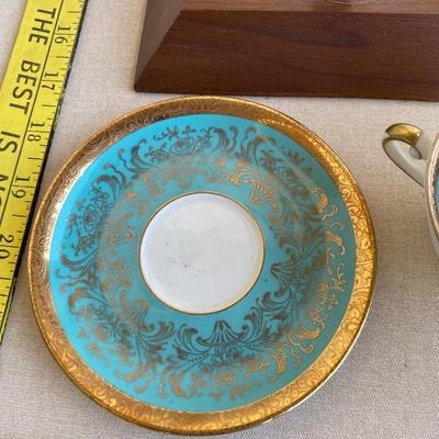 Teal and gold tea cup and saucer