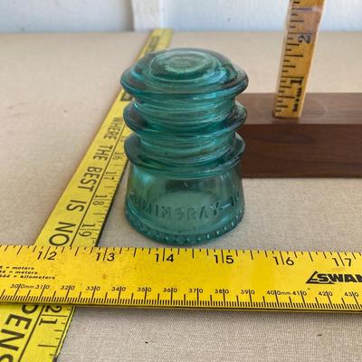 Vintage green glass insulator