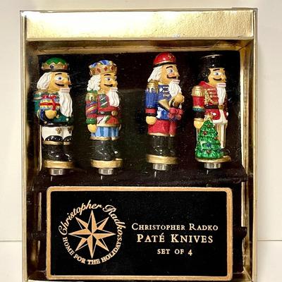 LOT 272  VINTAGE CHRISTOPHER RADKO NUTCRACKER PATE KNIVES HOME FOR THE HOLIDAYS COLLECTION