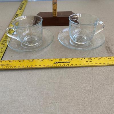 Set up to glass tea cups and saucerâ€™s