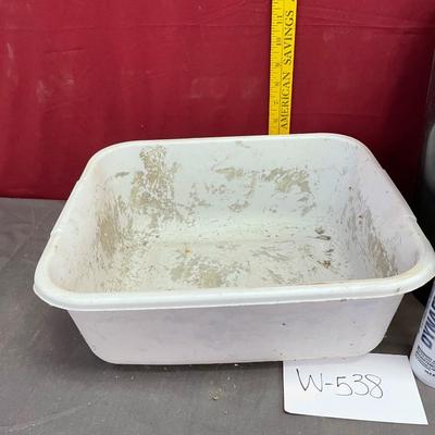 Tub, caulking and trash can