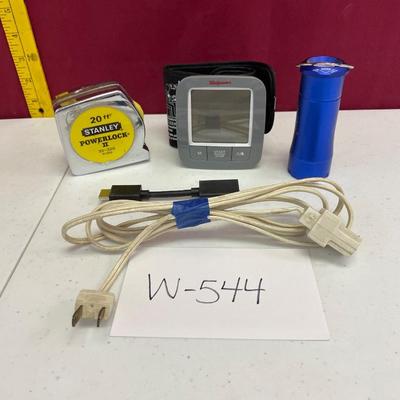 Tape measure, blood pressure monitor, flashlight, extension cord