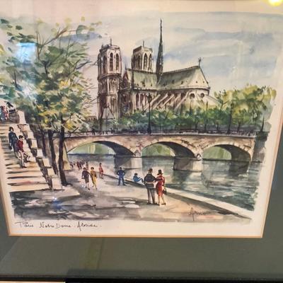 Two wall hangings of Paris scenes