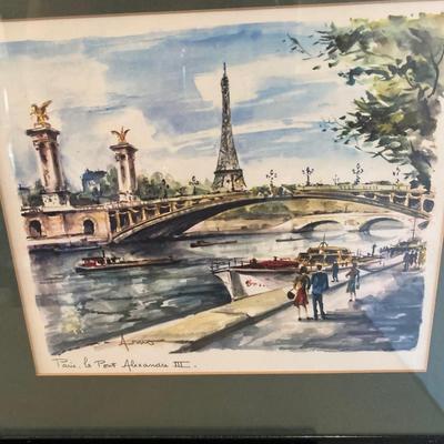 Two wall hangings of Paris scenes