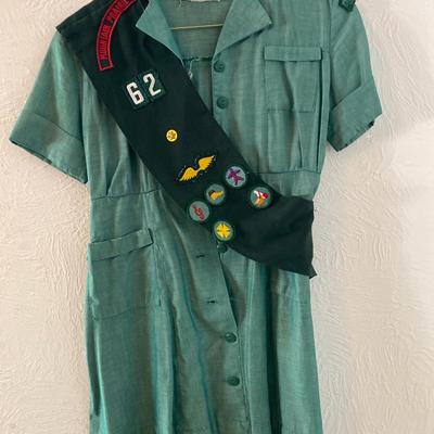 Vintage Girl Scout uniform with sash