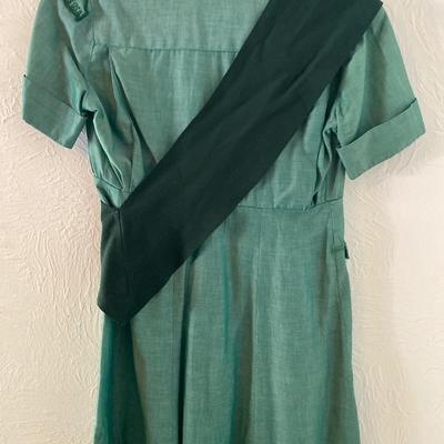 Vintage Girl Scout uniform with sash