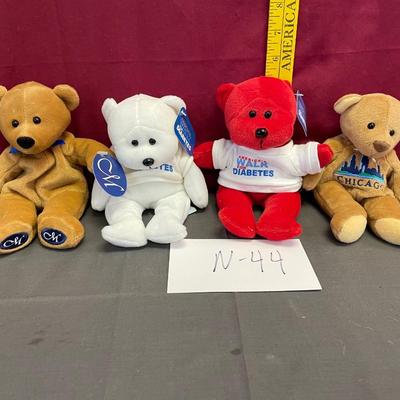 4 small teddy bears
