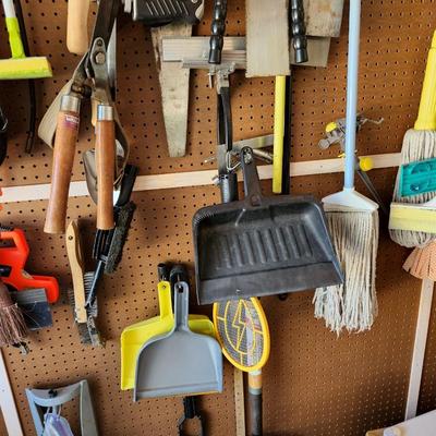 Garage Wall Lot Tools, Shovels, Saws, Mop, and More