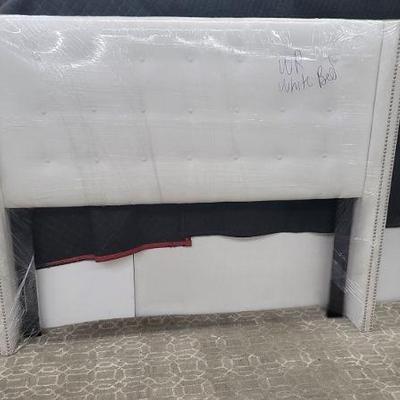 Bed 1
Queen  bed white micro suede wing style Queen,  platform bed with fabric rails and wood slats
Hardboard is H55" W67"  $610