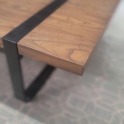 Modern wood and metal cocktail table 
H13" W55" D28"
$299