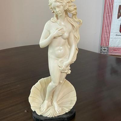 Nude woman on flower statue 17