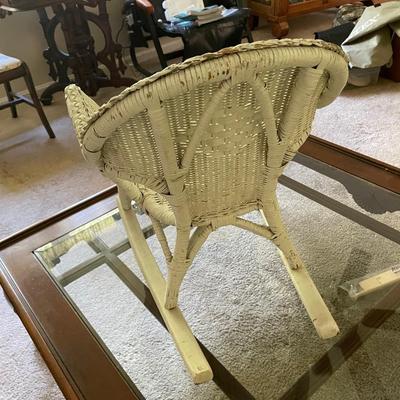 Childs Antique Wicker Rocker. Good Condition. Measures 18w x 16d x 22h