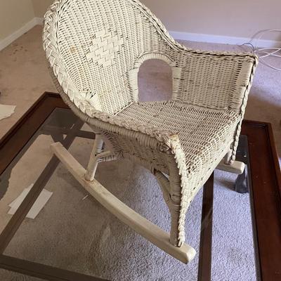 Childs Antique Wicker Rocker. Good Condition. Measures 18w x 16d x 22h