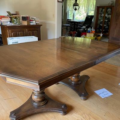 Ethan Allen Dining Room Table with free chairs.