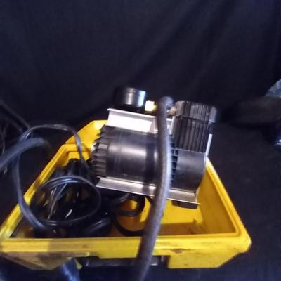 LOT 11 INTERCOMPRESSOR AND SCHUMACHER BATTERY CHARGER
