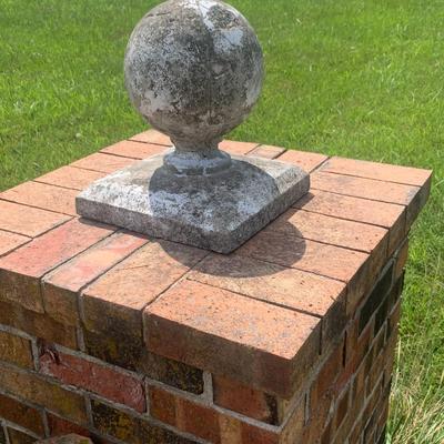 Nice pair of cement / concrete sitting lions with a set of cement/concrete balls ( 4 piece set)