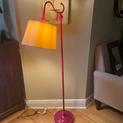 Pink floor lamp with white shade. 54â€ high.
