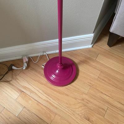 Pink floor lamp with white shade. 54â€ high.