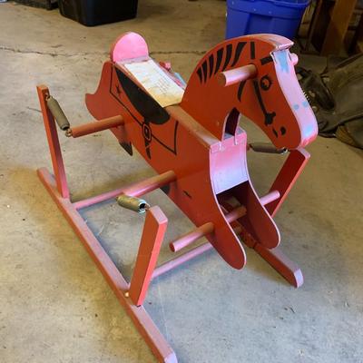 Vintage or antique wooden rocking horse