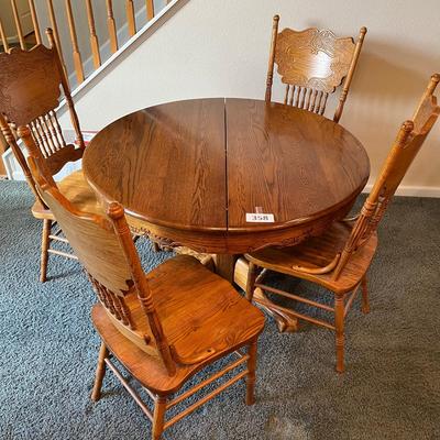 Oak Round table with Claw Feet & 4 Pressed back chairs