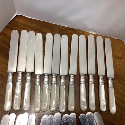 J1326 Large set of Mother of Pearl Handled Knives / Spreaders