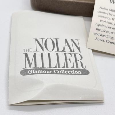 LOT 42: Nolan Miller Any Occasion Pierced Hoop Earrings