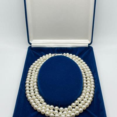 LOT 57: Jaqueline Kennedy 17" Triple Strand Simulated Pearl Necklace