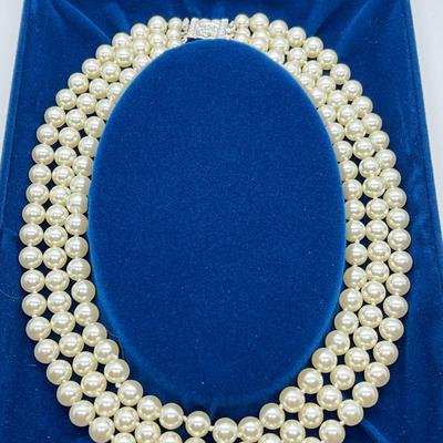 LOT 57: Jaqueline Kennedy 17" Triple Strand Simulated Pearl Necklace