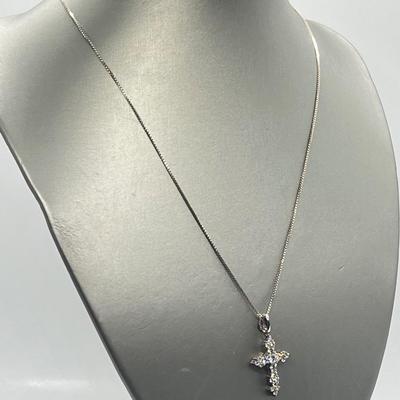 LOT 62: Sterling Silver Diamonique Cross Pendant on 20