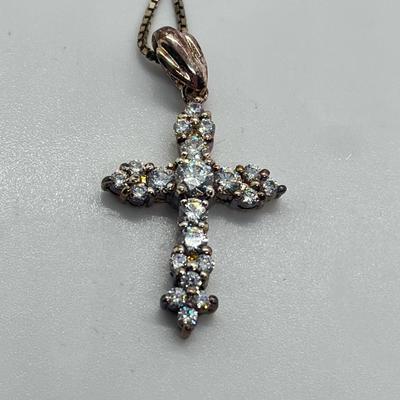 LOT 62: Sterling Silver Diamonique Cross Pendant on 20