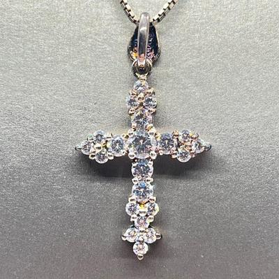 LOT 62: Sterling Silver Diamonique Cross Pendant on 20